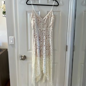 Lulu’s One Wish white lace medium midi dress.